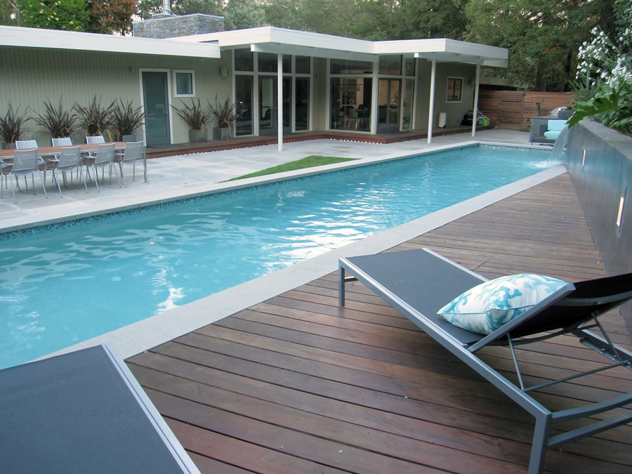 What are the benefits of using brick pavers for your swimming pool deck?